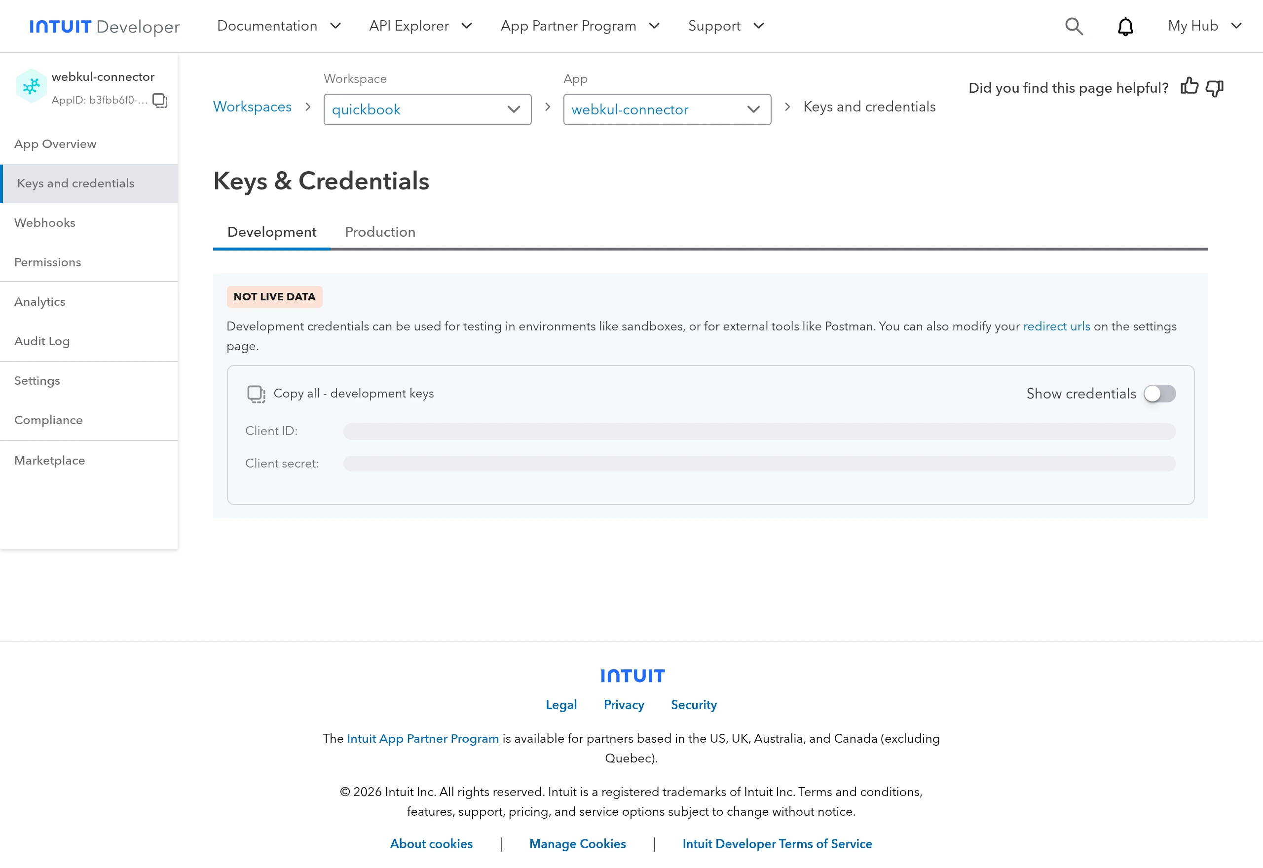The Keys & Credentials page with Development and Production tabs and the Show credentials toggle